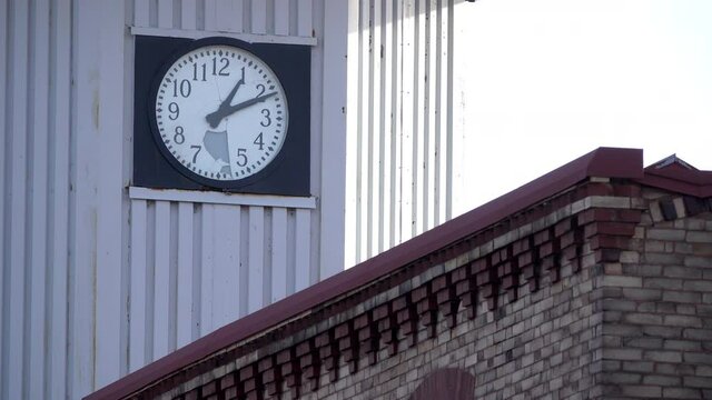 Close-up of clock on guard tower at Eastern State Penitentiary.