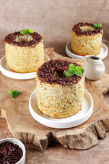 Mini banana chiffon cake with chocolate sauce.