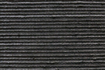 Horizontal line pattern of black plastic background and texture.