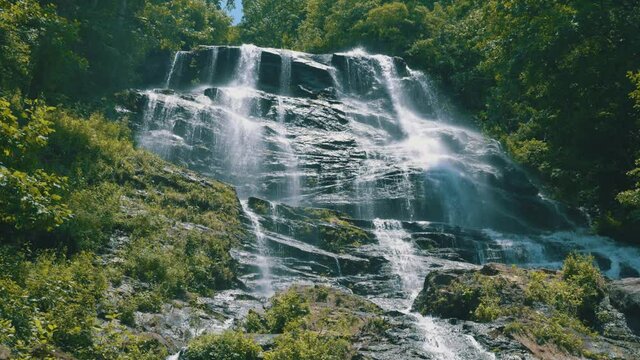 Beautiful footage of Amicalola Falls, the largest waterfall in all of Georgia &ndash; towering over the landscape at 729 feet tall