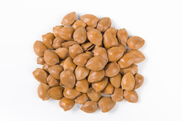 unpeeled almonds isolated on white background