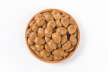 unpeeled almonds isolated on white background