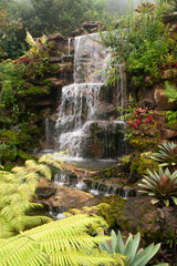 The waterfall was built in the park to decorate and beautify the place.