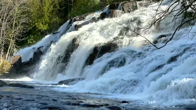 Beautiful Bond Falls in the Upper Peninsula of Michigan flowing in slow motion.
