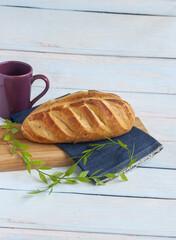 Rustic Bread in wood table and cup	