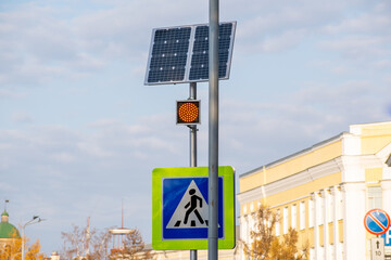 Power the warning flashing yellow signal at a pedestrian crossing. Solar panels