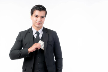 Business rich man trader wear a suit holding money US dollar bills in hand isolated on white background with copy space , concept for rich man business success , business trader concept