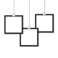 three suspended on a thread square photo frames on isolated on white background. Template for decoration and interior.