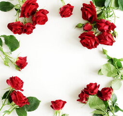 Red roses frame isolated on white background with copy space . Selective focus.Floral card.