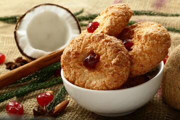 Oven fresh coconut cookies, homemade sweets background. 