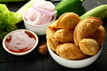 Crispy baked fresh curry puffs, samosa.
