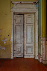 Beautiful white doors in the interior of a room in the Sharovsky castle, Kharkiv region, Ukraine