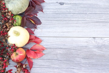 autumn still life with leaves and apples