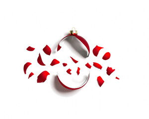 Broken Christmas ball red colored isolated on white, pattern with fragments of New Year glass ball.