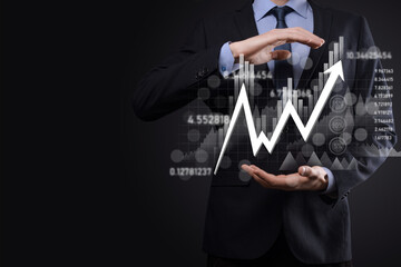 Businessman hold sales data and economic growth graph chart. Business planning and strategy. Analysing trading of exchange. Financial and banking. Technology digital marketing.Profit and growing plan.