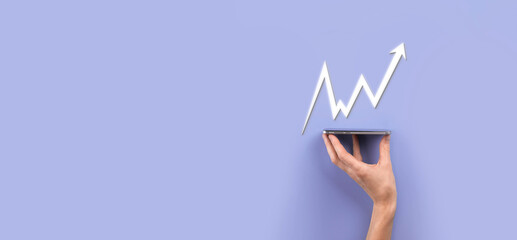 Businessman hold sales data and economic growth graph chart. Business planning and strategy. Analysing trading of exchange. Financial and banking. Technology digital marketing.Profit and growing plan.