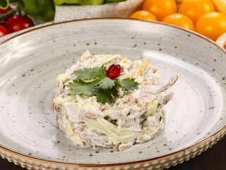 Russian myannaise salad with ham