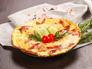 Tasty breakfast – omelet with meat