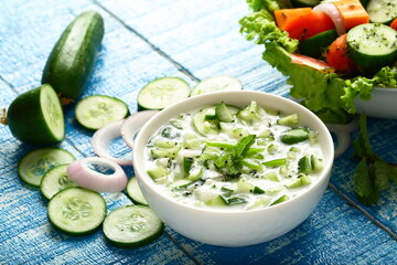 Healthy and delicious green raita salad with yogurt ,cucumber, onions.