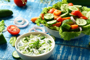 Healthy and delicious green raita salad with yogurt ,cucumber, onions.