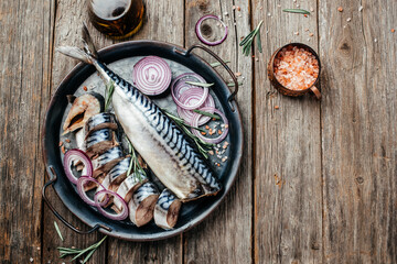 Fish mackerel on wooden background. Restaurant menu, dieting, cookbook recipe. place for text, top...