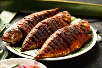Delicious fish fry with exotic spices ,Kerala seafood recipes.