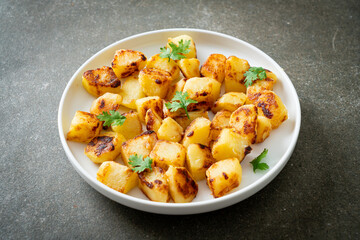 Roasted or grilled potatoes  on plate