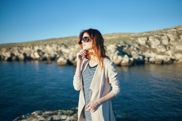 woman in sunglasses outdoors summer landscape sea fresh air