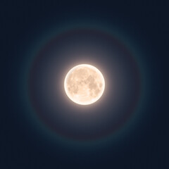 Full moon in night with halo