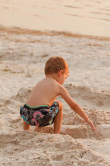 Child destroy sand castle.