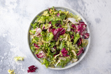 Mixed greens on a plate. Top view