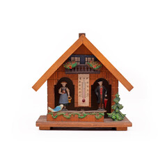 Decorative house shaped barometer on white background