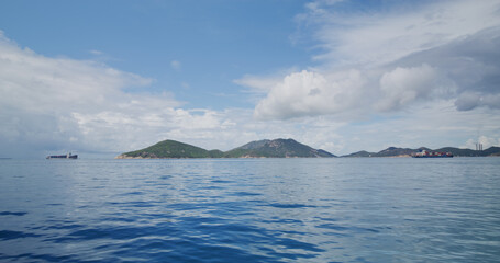Blue sky with white cloud and sea