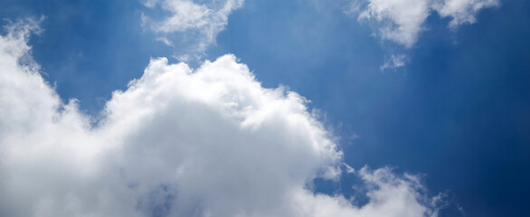 Obraz premium Blue sky background with white clouds. Panorama