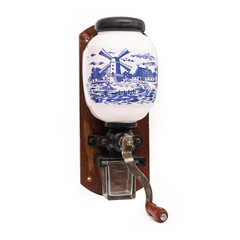 Fototapeta na wymiar porcelain coffee grinder on white background