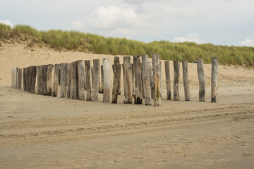breakwaters on the empty beach 