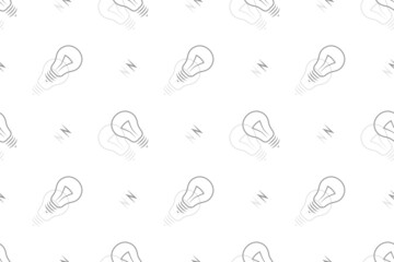 Background on the theme of light bulbs and lighting.Seamless pattern From the silhouette of light bulbs.