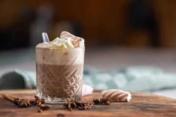 Foto op Aluminium Hot chocolate with whipped cream on a wooden cutting board. Marshmallows.  © Hugo