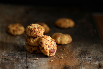 Chocolate cookies on wooden table.