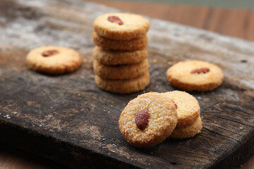 Chocolate cookies on wooden table.