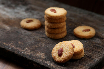 Chocolate cookies on wooden table.