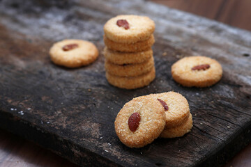 Chocolate cookies on wooden table.