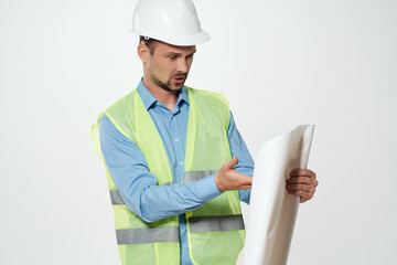 male builder in a white helmet engineer safety isolated background