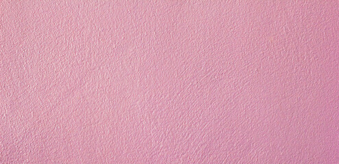 Pink concrete wall for texture background and copy space.