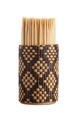 a bunch of toothpicks in a paper wicker container on a white background