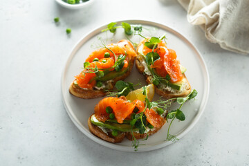 Homemade salmon bruschetta with green pea