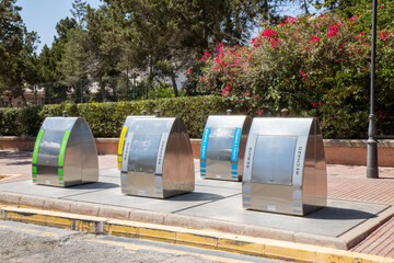 Underground recycling bins on the street of Ibiza in Spain