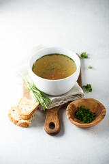 Homemade chicken stock with green onion