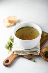 Homemade chicken stock with green onion
