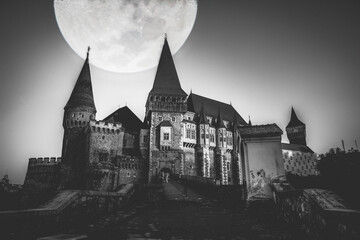 haunted castle at night in Transylvania Halloween background